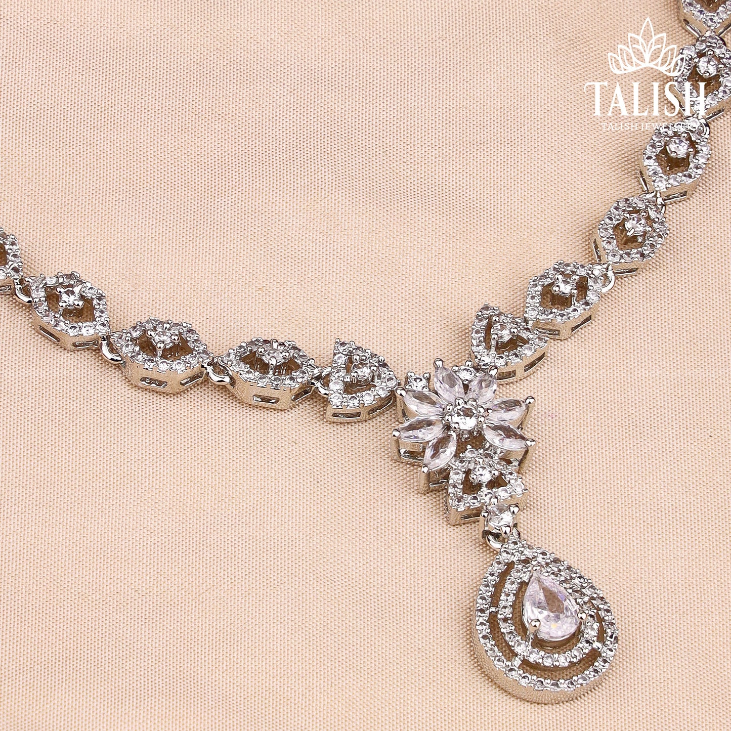 Elegant Silver-Plated Necklace Set with Intricate Floral Design and Sparkling American Diamond Stones