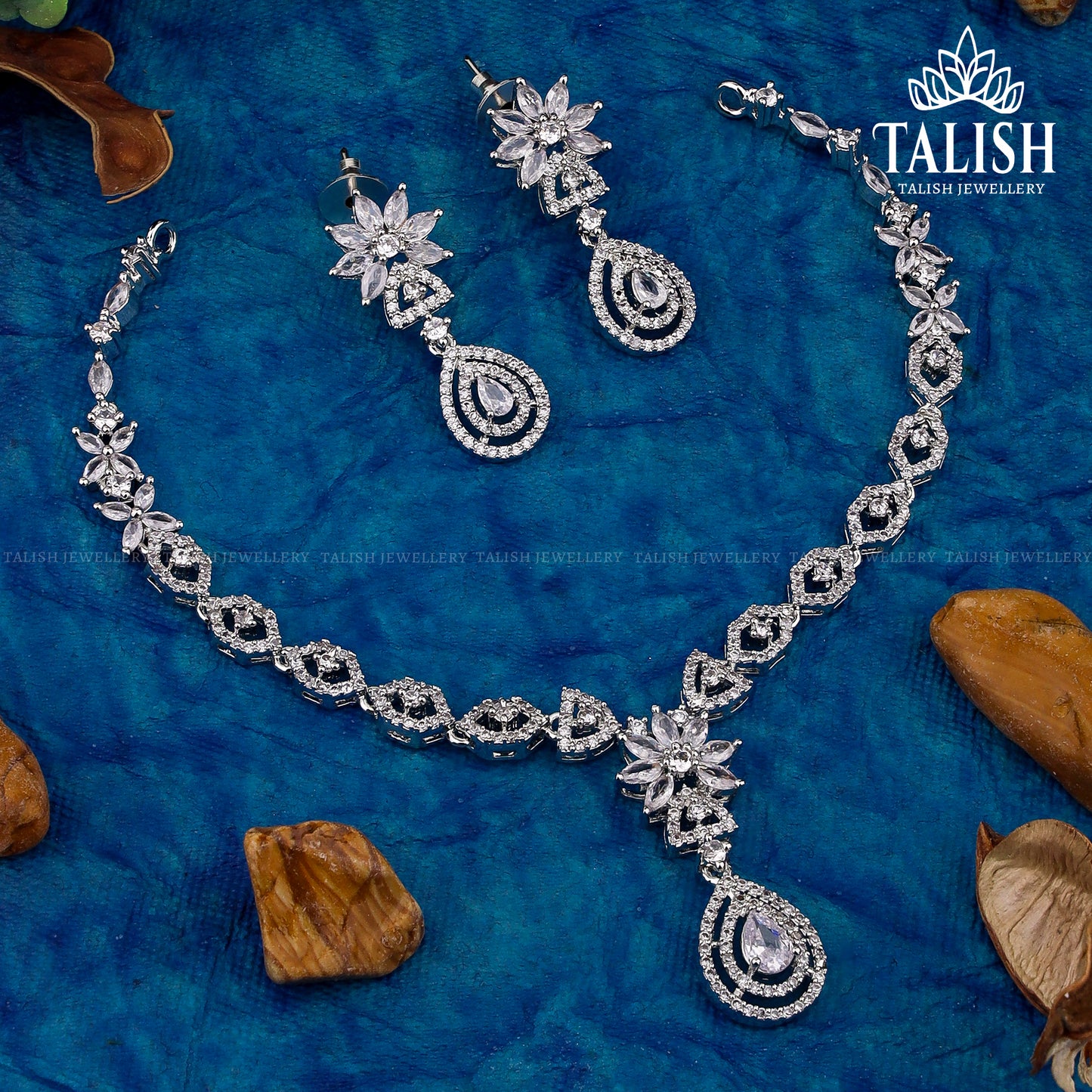 Elegant Silver-Plated Necklace Set with Intricate Floral Design and Sparkling American Diamond Stones