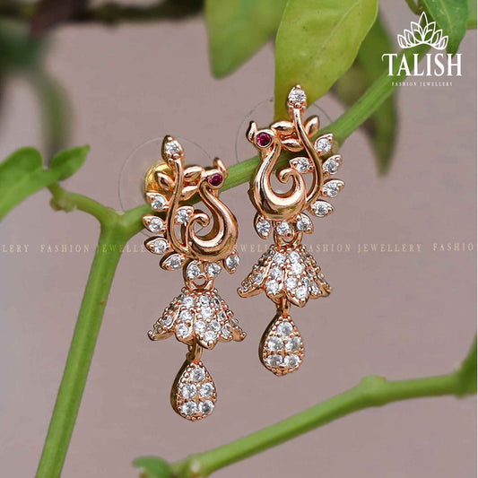 Elegant gold-plated earrings featuring sparkling crystal drops, perfect for adding a touch of sophistication to any outfit.