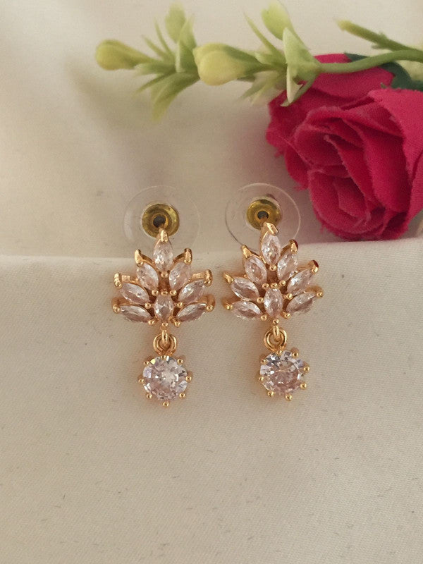 Gold and crystal drop earrings with a floral design.