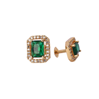 Gold earrings with square green gemstones surrounded by small clear stones.